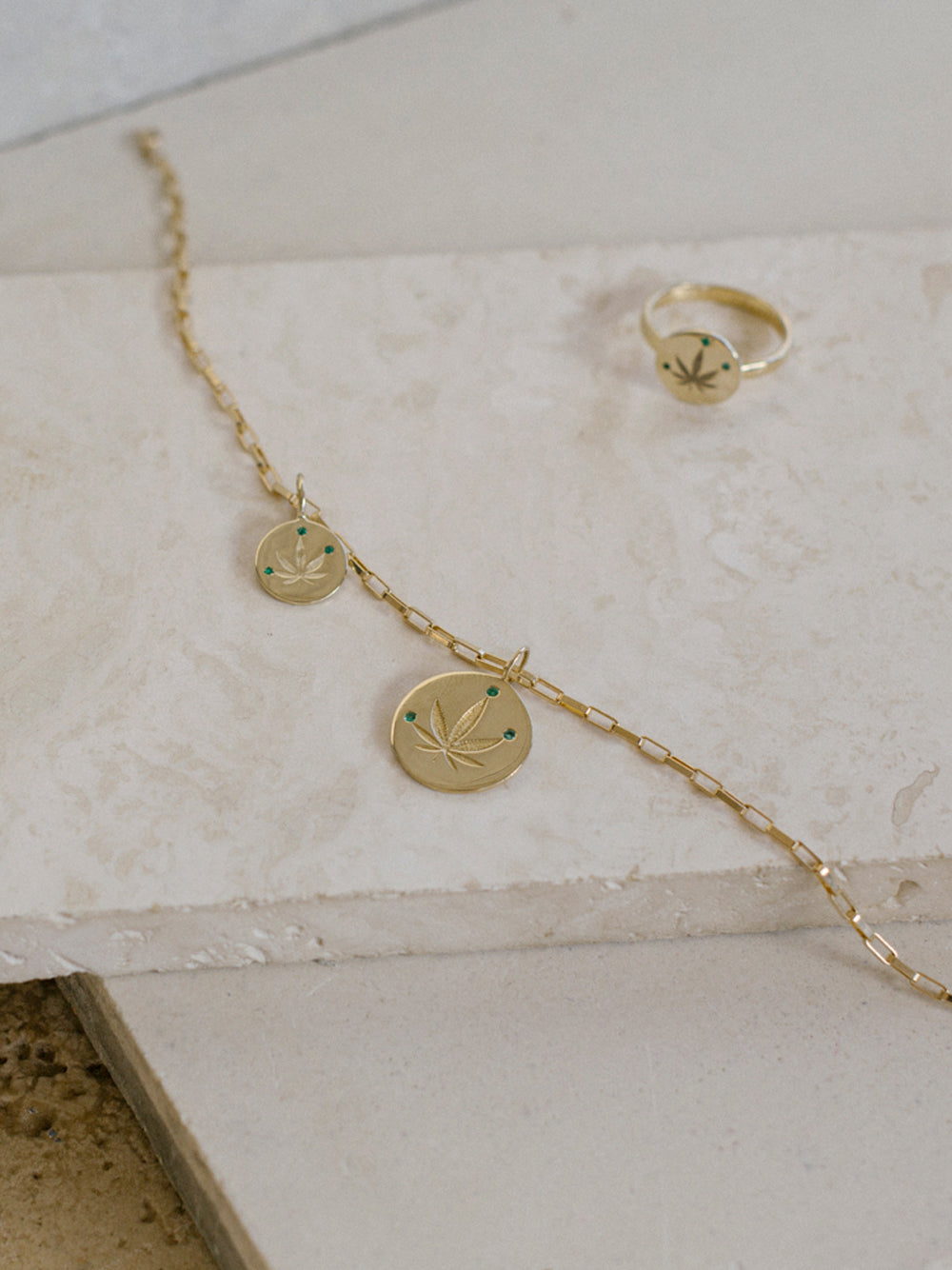 Gold and Emerald Cannabis Leaf Charm