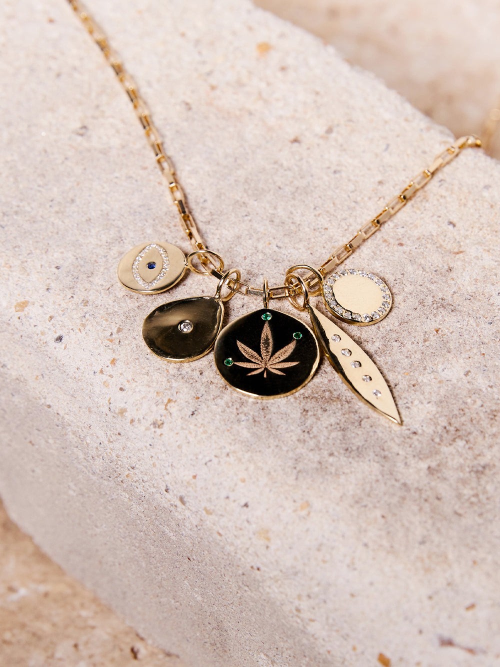 Gold and Emerald Cannabis Leaf Charm