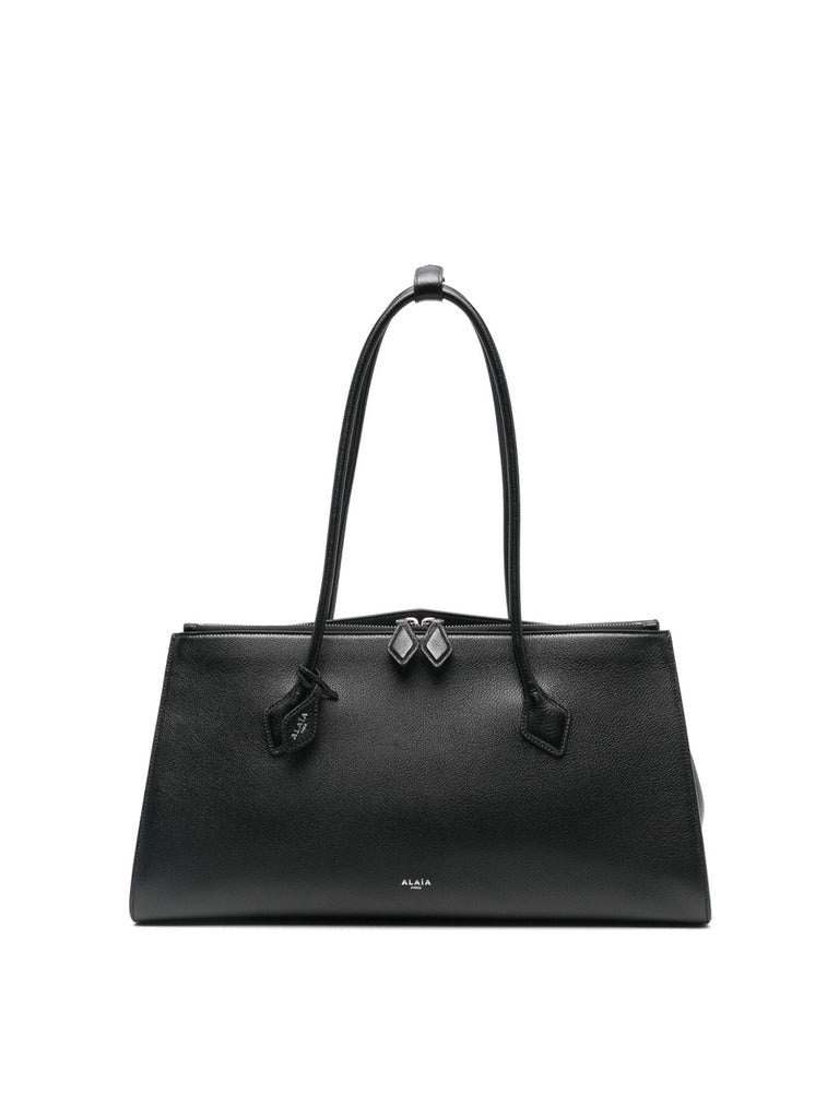 トートバッグ Alaia LE TECKEL TOTE BAG Le Teckel leather tote bag in grey - Alaia | Mytheresa